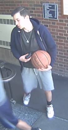 person holding a basketball at IM Building 