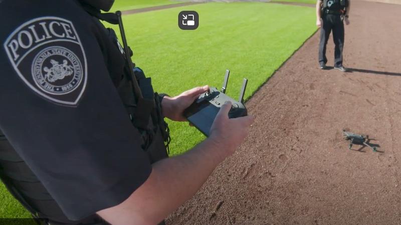Officer operating drone at Medlar Field.